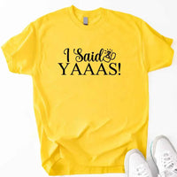 May include Daisy I Said YAAAS Bachelorette Crew Party Matching T-Shirts, featuring "I Said YAAAS" and "Bride" graphics, made from soft cotton for comfort and perfect for group photos at bachelorette parties.