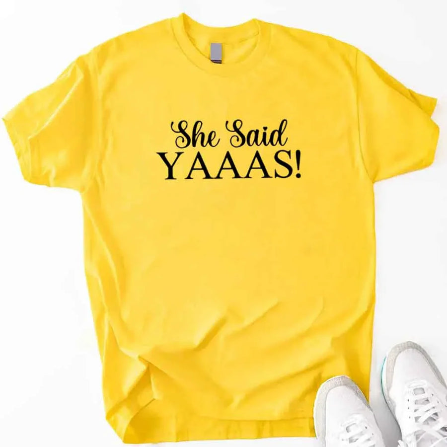 May include Daisy I Said YAAAS Bachelorette Crew Party Matching T-Shirts, featuring "I Said YAAAS" and "Bride" graphics, made from soft cotton for comfort and perfect for group photos at bachelorette parties.