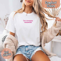 May include a women’s Comfort Colors t-shirt featuring the phrase “I’m a Mommy” or “Mamacita” in stylish, playful lettering, designed with a soft, lived-in look that celebrates motherhood with a confident and fun tone.