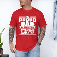 May include a father and child wearing matching t-shirts reading “I’m A Proud Dad” and “Me”