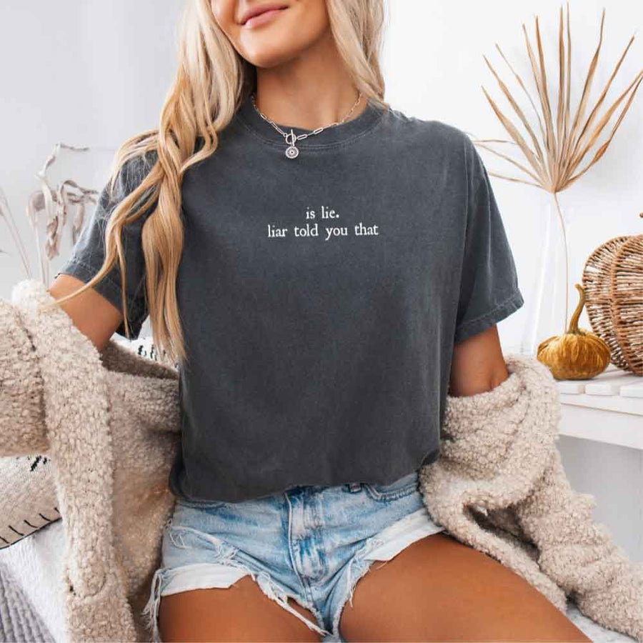 May include a person wearing a Pepper Is Lie Liar Told You That Comfort Colors T-Shirt featuring rivalry inspired graphic and relaxed fit.