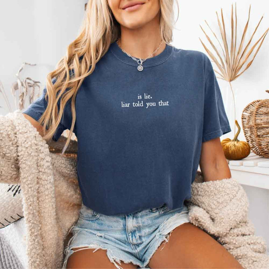 May include a person wearing a Denim Is Lie Liar Told You That Comfort Colors T-Shirt featuring rivalry inspired graphic and relaxed fit.