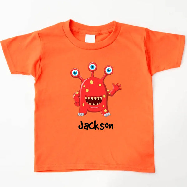 May include person wearing an orange I’ve Created Monsters Tee with humorous parenting statement.
