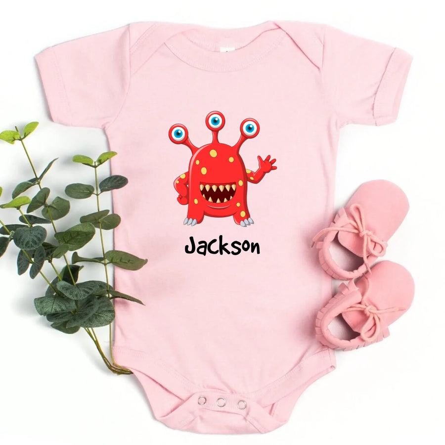 May include person wearing a pink I’ve Created Monsters Tee with bold humorous text design.
