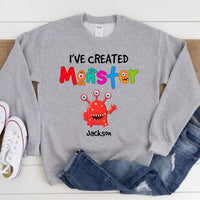 May include person wearing a grey I’ve Created Monsters Tee featuring playful parenting humor graphic.
