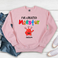 May include person wearing a pink I’ve Created Monsters Tee with bold humorous text design.
