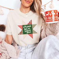 May include an O Come Let Us Adore Him Comfort Colors Christmas T-Shirt featuring a Christian holiday message inspired by a beloved Christmas hymn, designed for church services, family gatherings, worship events, and meaningful seasonal gifting.