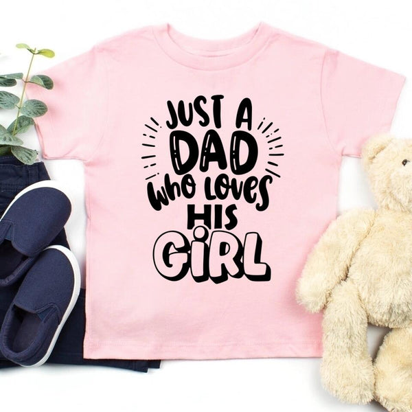 May include a unisex T-shirt with the phrase Just A Dad Who Loves His Girl printed on the front.