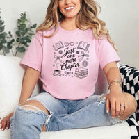 May include a person wearing a Pink Just One More Chapter T-Shirt featuring trendy book lover graphic and relaxed fit.