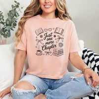 May include a person wearing a Peach Just One More Chapter T-Shirt featuring trendy book lover graphic and relaxed fit.