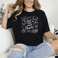 May include a person wearing a Black Just One More Chapter T-Shirt featuring trendy book lover graphic and relaxed fit.