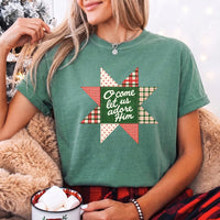 May include an O Come Let Us Adore Him Comfort Colors Christmas T-Shirt featuring a Christian holiday message inspired by a beloved Christmas hymn, designed for church services, family gatherings, worship events, and meaningful seasonal gifting.
