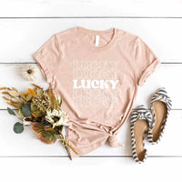 May include a Lucky 5 St. Patty’s T-Shirt featuring a festive Irish-inspired design with green tones and bold typography.