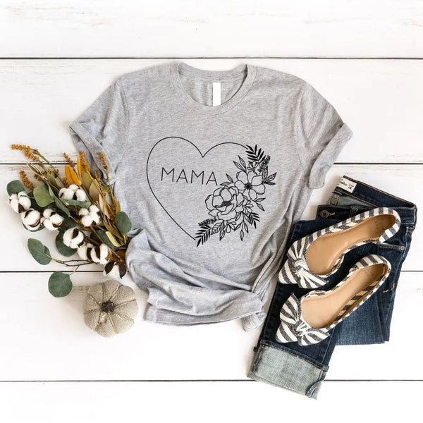 May include a minimalist “Mama” t-shirt with a small heart graphic, designed for moms and printed on soft cotton fabric.