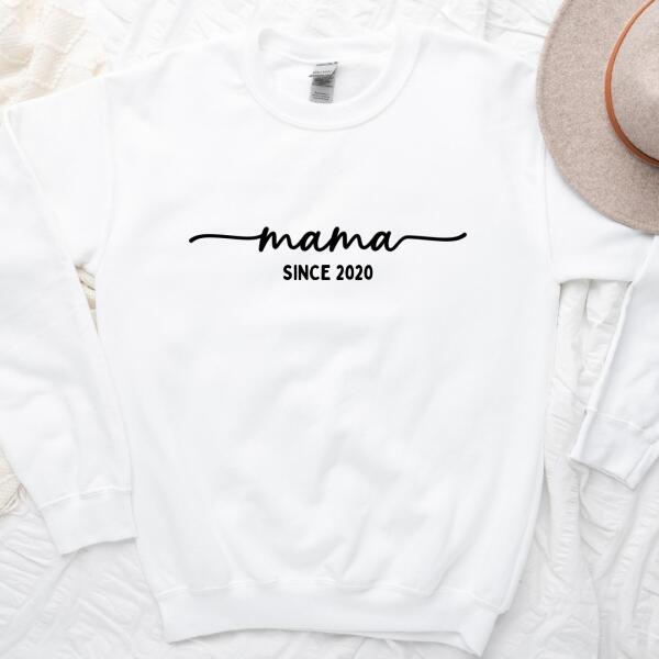 May include a personalized “Mama Since” shirt featuring minimalist lettering with a customizable year printed on the front.