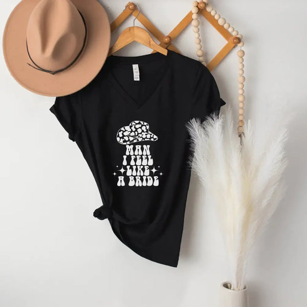May include Black “Man I Feel Like a Bride” matching V-neck t-shirt for bachelorette party, bride squad country themed design.