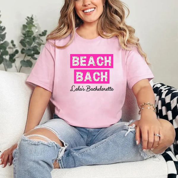 May include Pink personalized matching beach bridal shirts for bridesmaids, maid of honor, and bride, perfect for bachelorette parties and bridal showers.