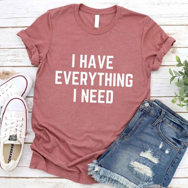 May include a couples t-shirt design featuring the phrase “I Have Everything I Need” and "I Am Everything|in clear, balanced lettering, often paired with a small heart or matching graphic that reflects love, gratitude, and partnership.