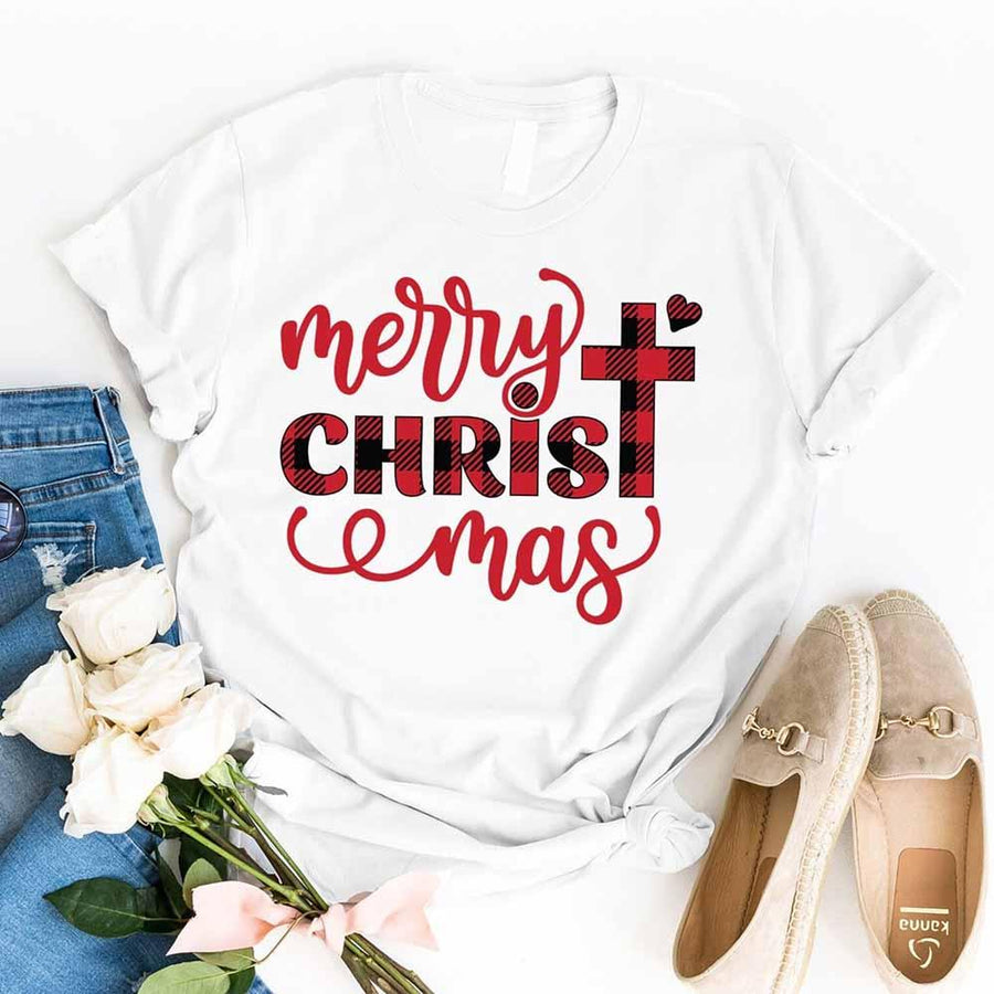 White Merry Christmas T-shirt with red plaid text, styled with jeans, shoes, and white roses