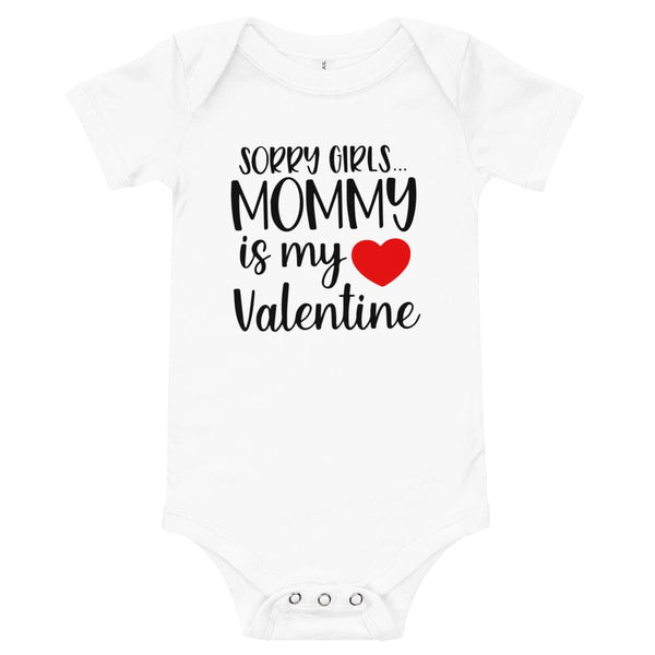 White baby onesie with text and a heart design on a white background