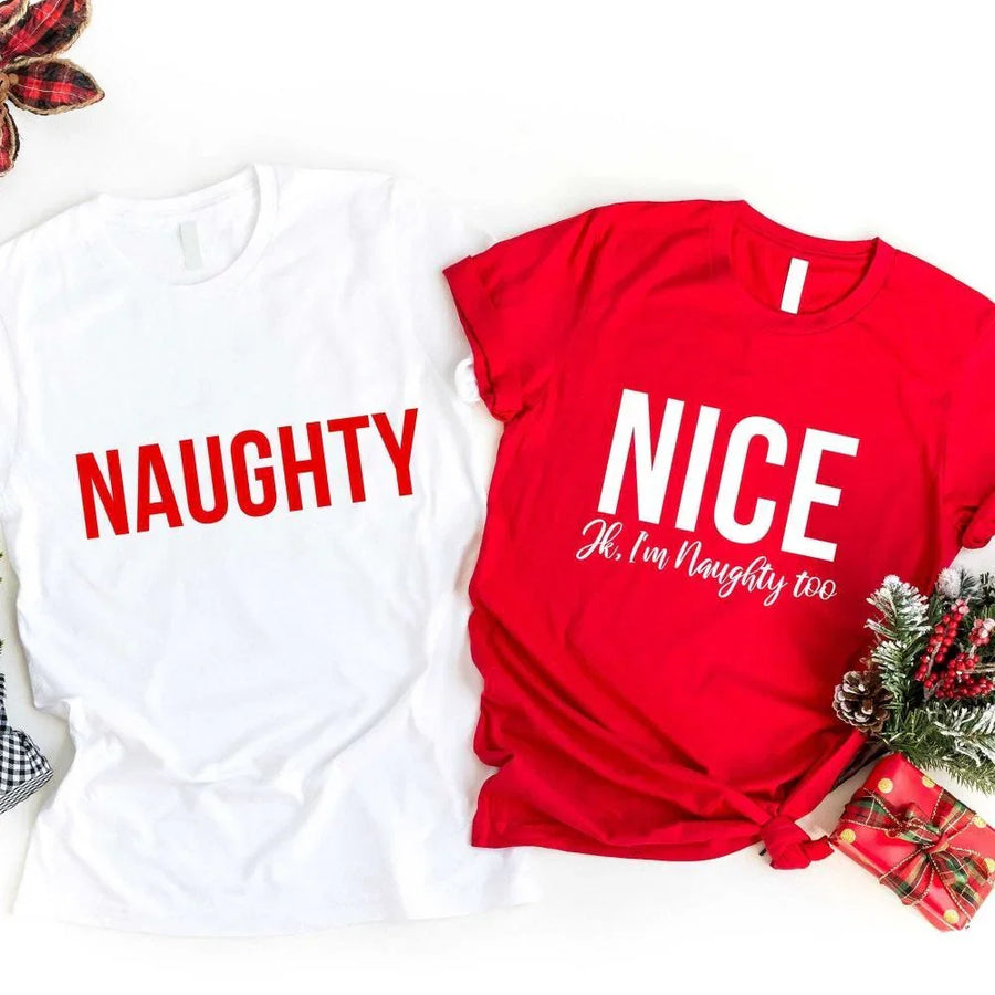 May include a unisex Christmas T-shirt with the phrase “Nice, Jk I'm Naughty Too” printed in bold seasonal lettering.