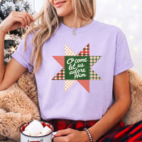 May include an O Come Let Us Adore Him Comfort Colors Christmas T-Shirt featuring a Christian holiday message inspired by a beloved Christmas hymn, designed for church services, family gatherings, worship events, and meaningful seasonal gifting.