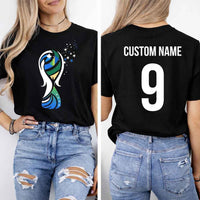 May include a person wearing a black 2026 World Cup T-shirt featuring bold soccer graphic and relaxed fit.