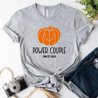 May include a fall-themed couple's design featuring a pumpkin graphic paired with a spice jar, personalized names, and a warm autumn color palette.