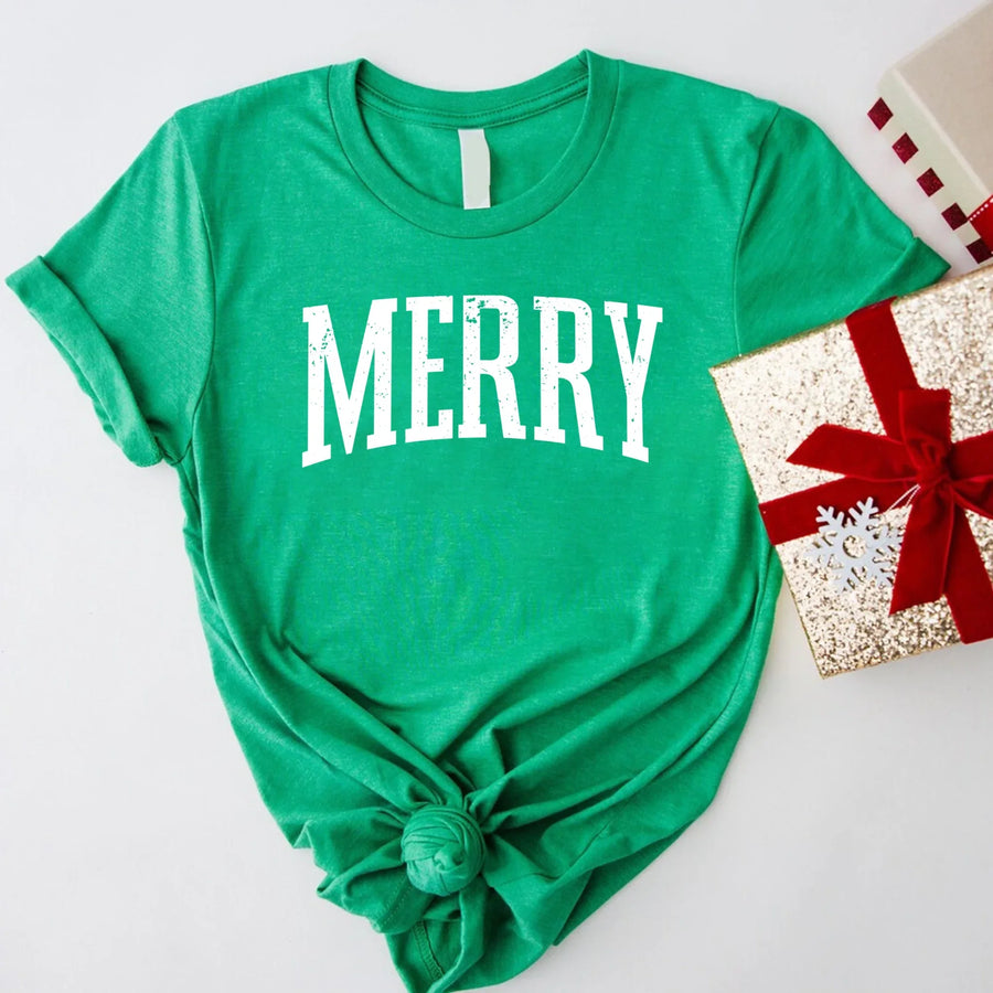 May include an image of the “Merry ” T-shirt featuring a vintage-inspired holiday print on a soft women’s cotton tee with a festive relaxed fit.