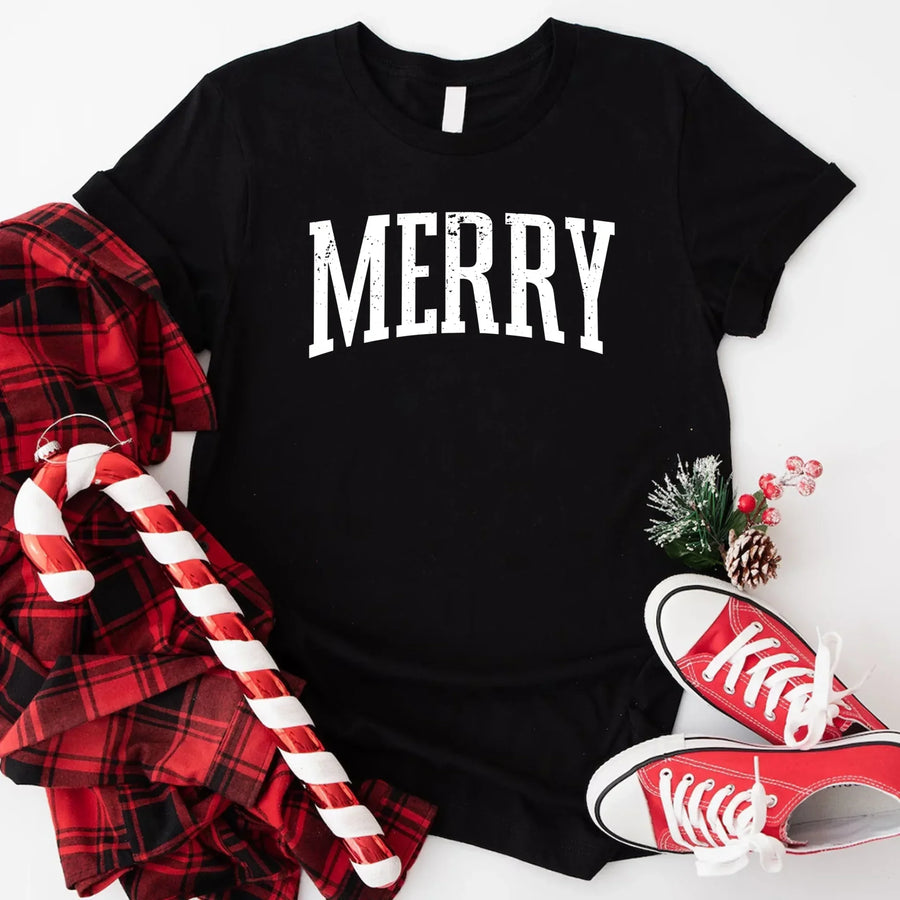 May include an image of the “Merry ” T-shirt featuring a vintage-inspired holiday print on a soft women’s cotton tee with a festive relaxed fit.
