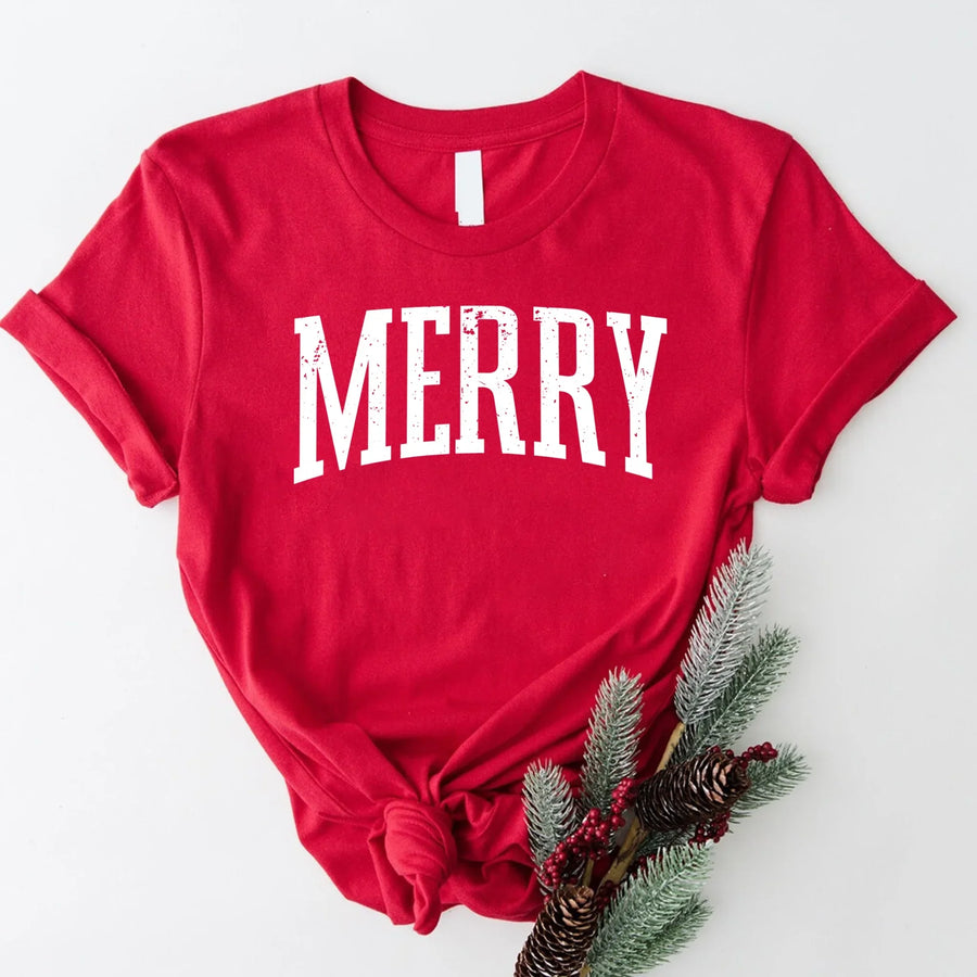 May include an image of the “Merry ” T-shirt featuring a vintage-inspired holiday print on a soft women’s cotton tee with a festive relaxed fit.