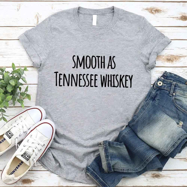 May include a matching couples t-shirt design featuring the phrase “Smooth as Tennessee Whiskey” and "Sweet as Strawberry Wine" in a bold, rustic-style font, reflecting a playful, country-inspired theme that celebrates love with a touch of humor.