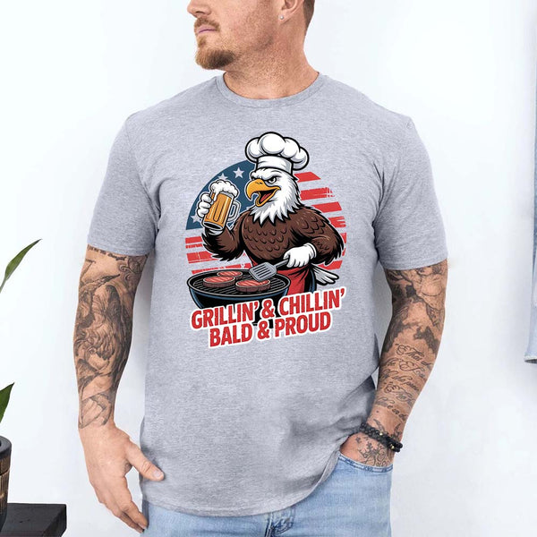 Person wearing a gray t-shirt with an eagle graphic and text on a white background