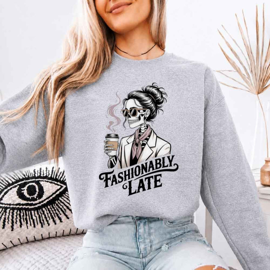 May include a unisex crewneck sweatshirt with “Fashionably Late” funny text graphic printed on the front.