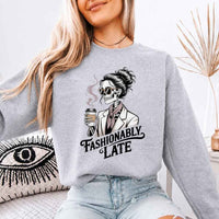 May include a unisex crewneck sweatshirt with “Fashionably Late” funny text graphic printed on the front.