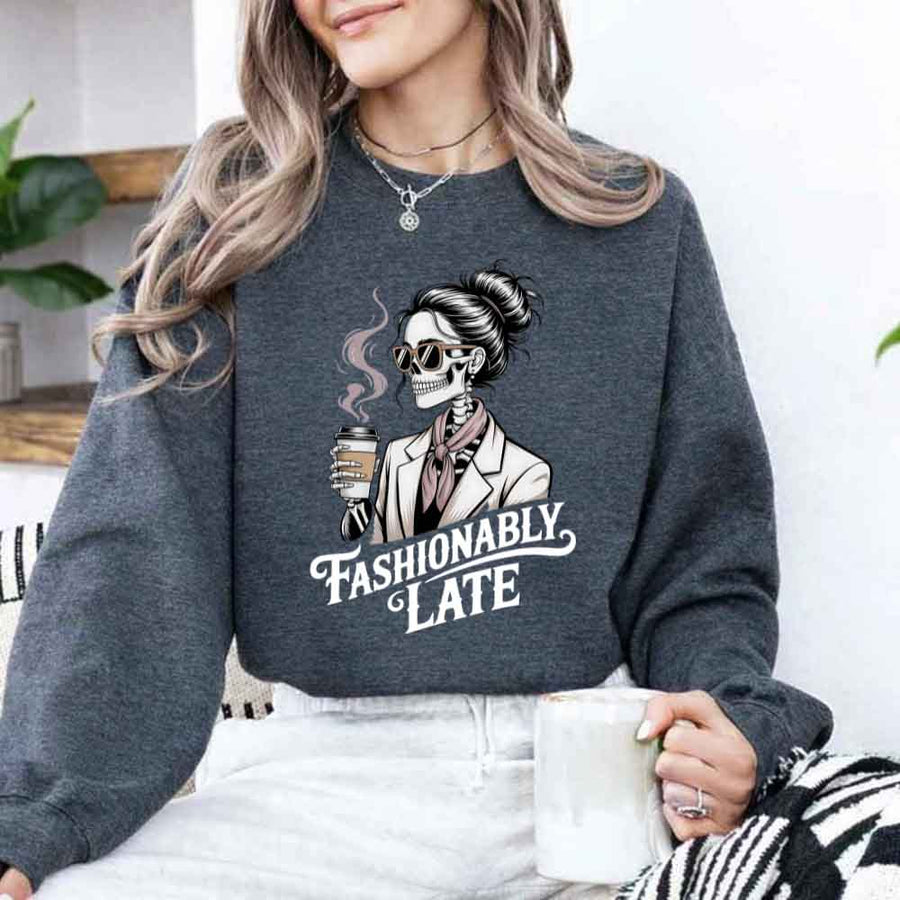 May include a unisex crewneck sweatshirt with “Fashionably Late” funny text graphic printed on the front.