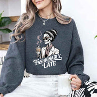 May include a unisex crewneck sweatshirt with “Fashionably Late” funny text graphic printed on the front.