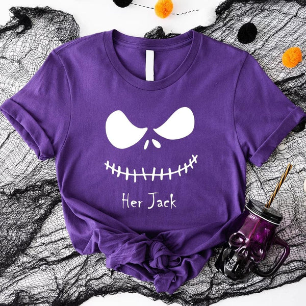 Purple t-shirt with white graphic and 'Her Jack' text on a Halloween-themed background