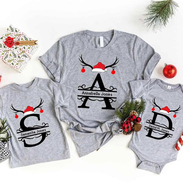 May include a personalized Christmas T-shirt with a single initial printed in a holiday-themed design on the front.