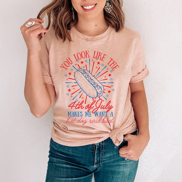 Person wearing a t-shirt with a 4th of July graphic and text.
