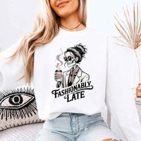 May include a unisex crewneck sweatshirt with “Fashionably Late” funny text graphic printed on the front.
