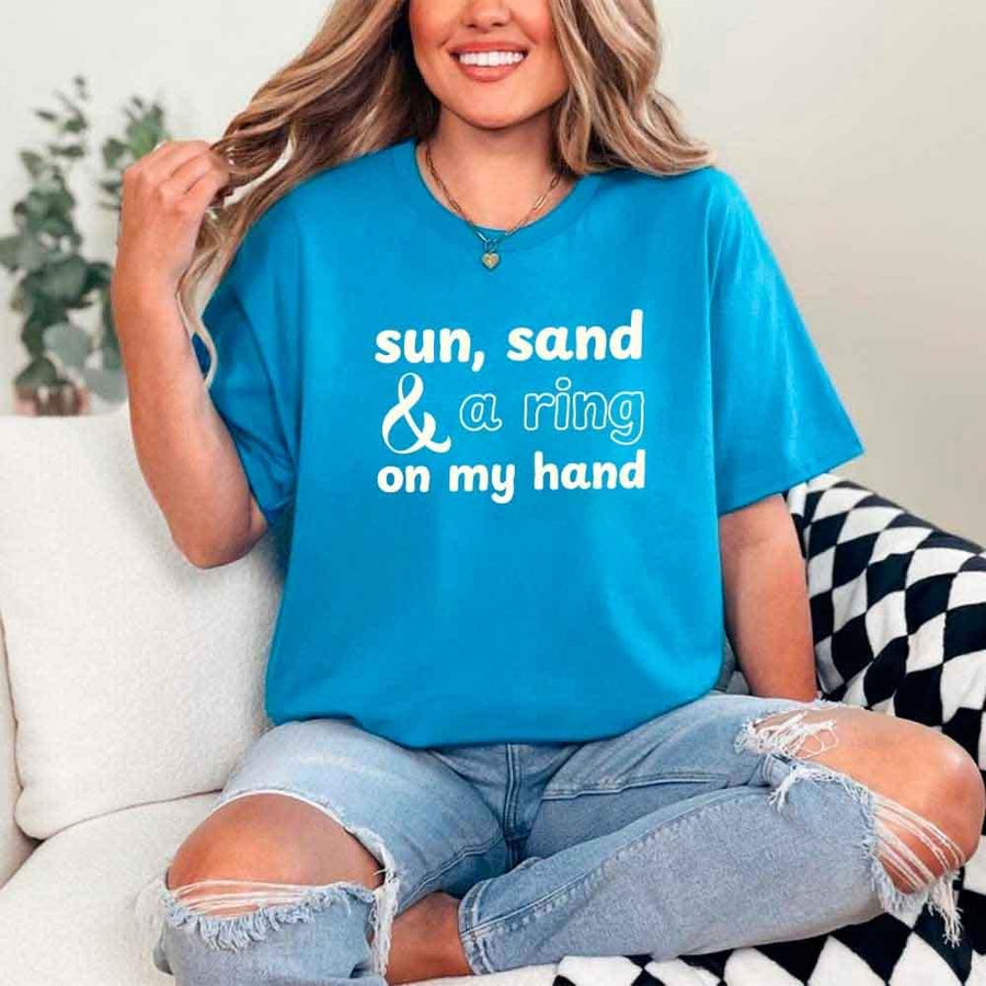 May include Sapphire beach themed wedding party t-shirts with Sun Sand and A Ring On My Hand slogan, tropical colors, bridal group apparel for summer celebrations!