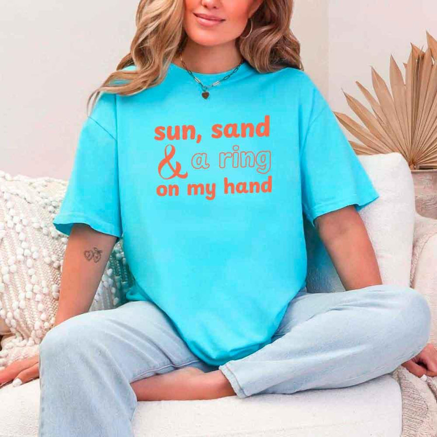 May include Turquoise beach themed wedding party t-shirts with Sun Sand and A Ring On My Hand slogan, tropical colors, bridal group apparel for summer celebrations!