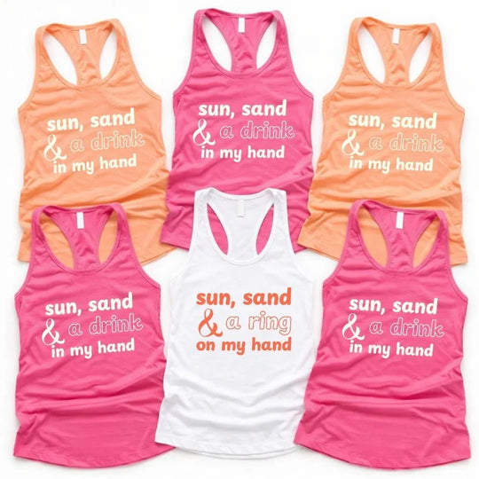 May include a tank top with the phrase “Sun Sand & A Ring On My Hand” in a stylish summer font, ideal for brides.