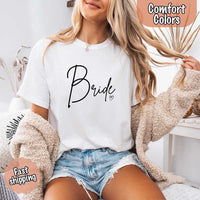 White  Colors t-shirts with "Bride" design, perfect for the bride, bridesmaids, or bachelorette party, featuring stylish lettering for bridal proposals and celebrations.