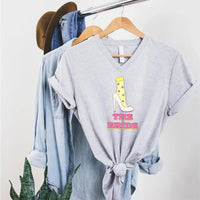 May include Team Bride & The Bride matching V-Neck T-Shirts for bachelorette party, with designs for bride and bridesmaids.