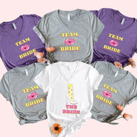 May include Team Bride & The Bride matching V-Neck T-Shirts for bachelorette party, with designs for bride and bridesmaids.