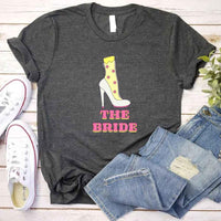 May include Dark heather Team Bride & The Bride Bachelorette Party Matching T-Shirts, featuring "Team Bride" and "The Bride" designs in soft cotton fabric, perfect for pre-wedding celebrations and group photos.