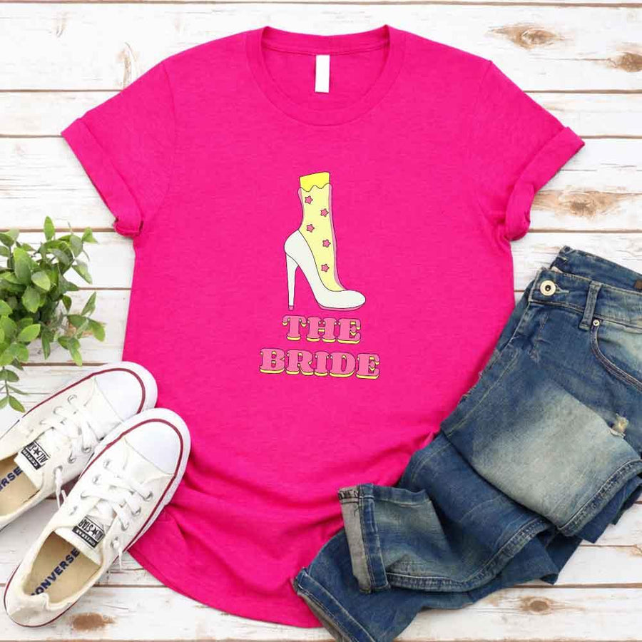 May include Heliconia Team Bride & The Bride Bachelorette Party Matching T-Shirts, featuring "Team Bride" and "The Bride" designs in soft cotton fabric, perfect for pre-wedding celebrations and group photos.