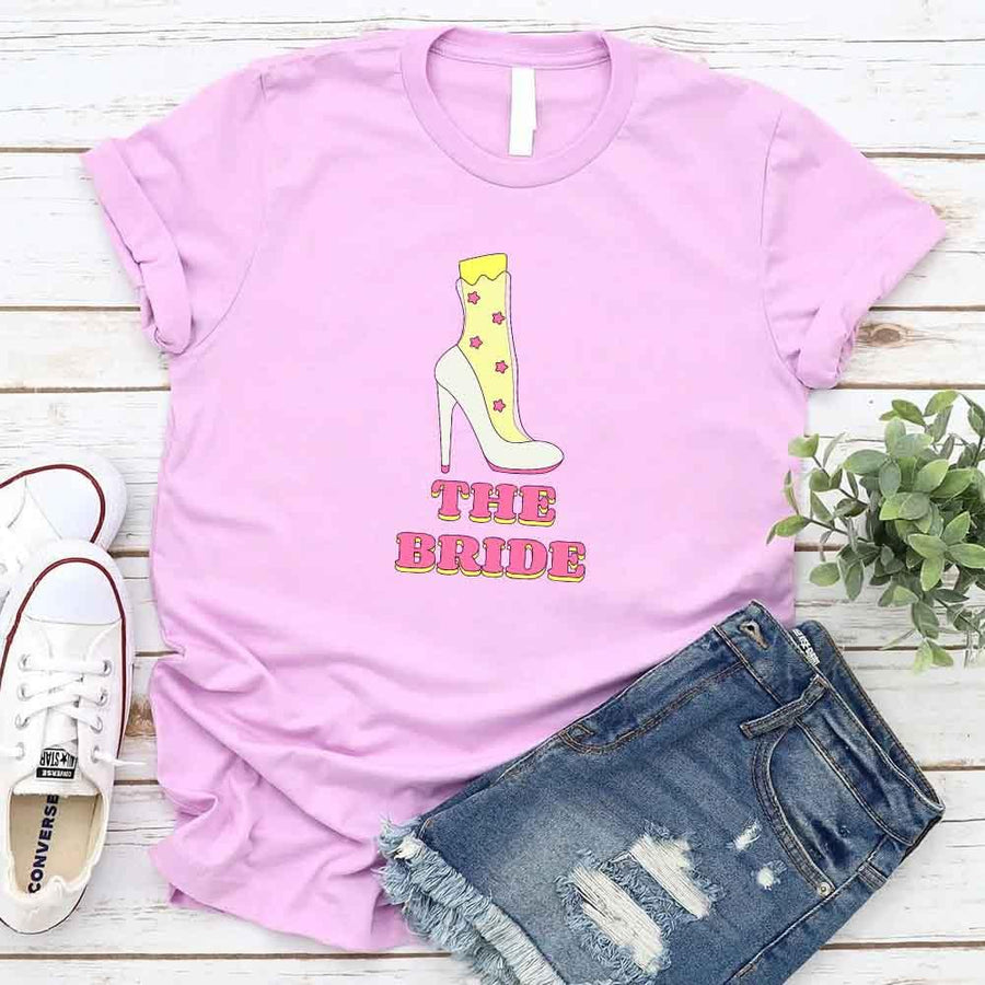 May include Lilac Team Bride & The Bride Bachelorette Party Matching T-Shirts, featuring "Team Bride" and "The Bride" designs in soft cotton fabric, perfect for pre-wedding celebrations and group photos.